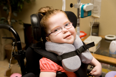 Image of child in wheelchair 